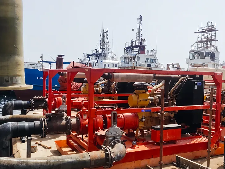 Chemical Flushing Project - red pumps and pipeline setup